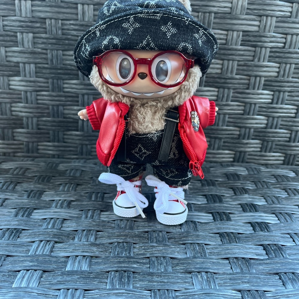 Stylish Black Labubu outfit with red jacket.